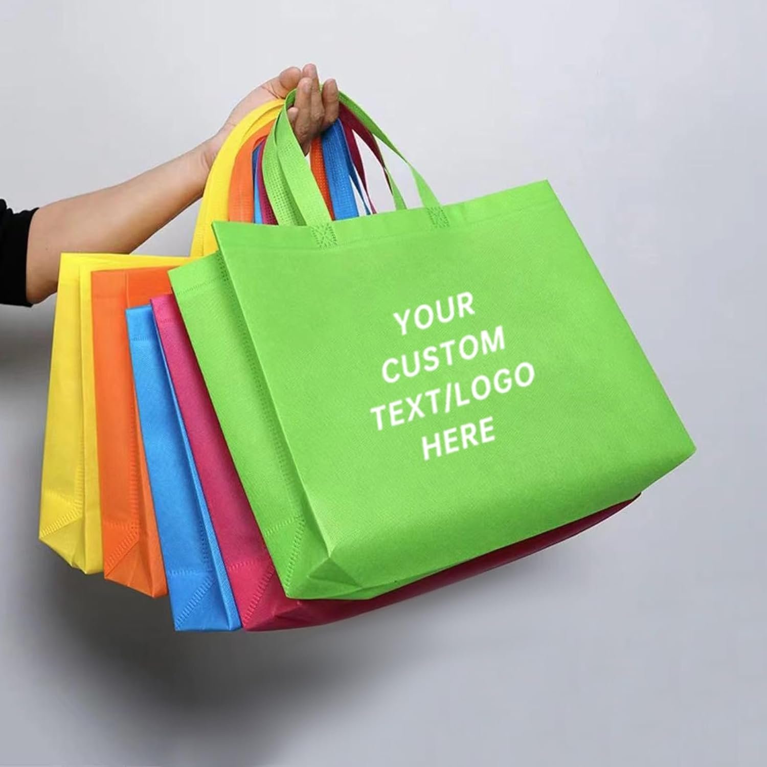 100 sacs de shopping réutilisables - Grossiste en sacs personnalisés avec logo pour publicité commerciale et promotions, idéal pour les fabricants de sacs en gros.