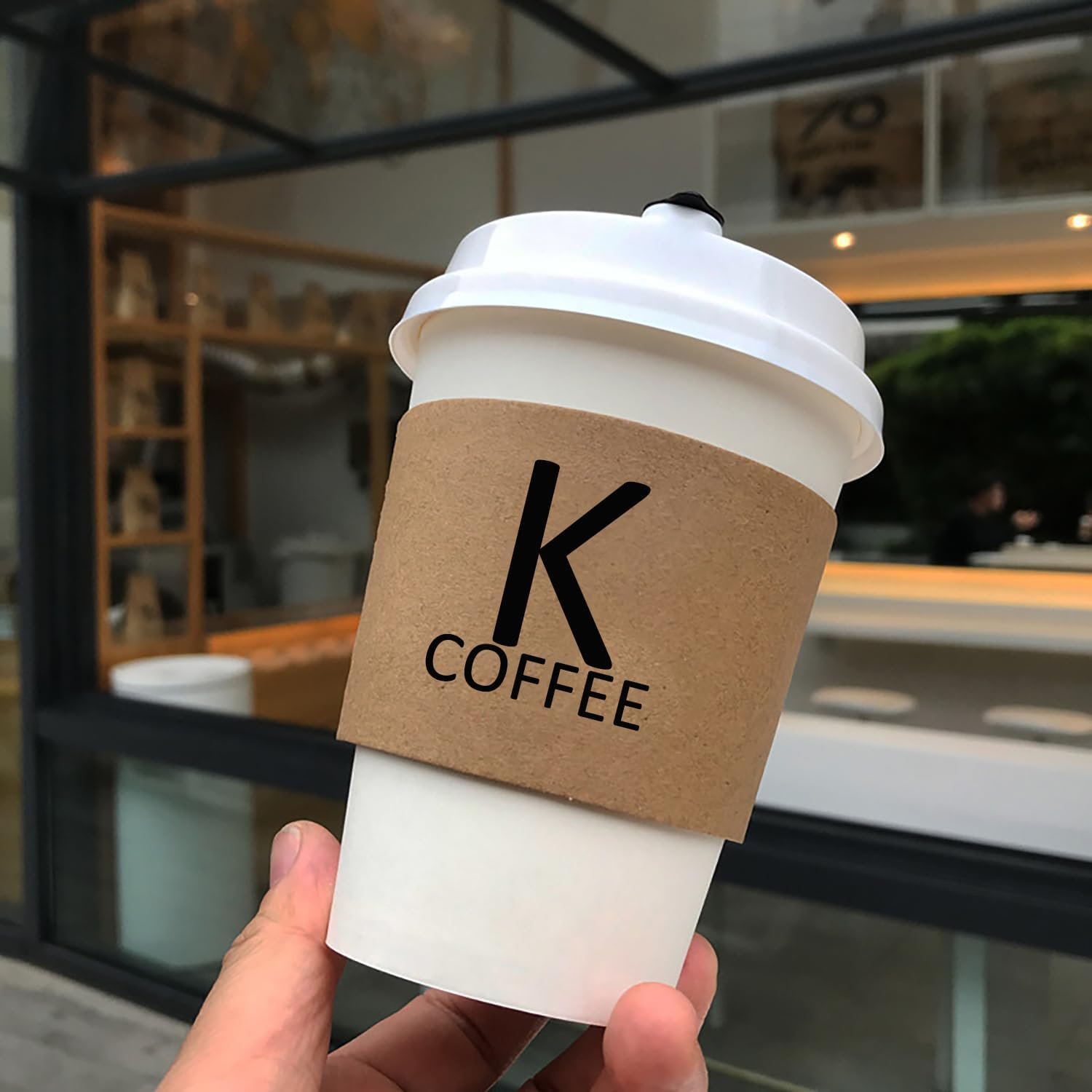 Grossiste en manches de café Kraft personnalisées, logos sur mesure pour entreprise, bureau, coffee shop, événements de mariage et voyages - Fabricant de solutions personnalisées.