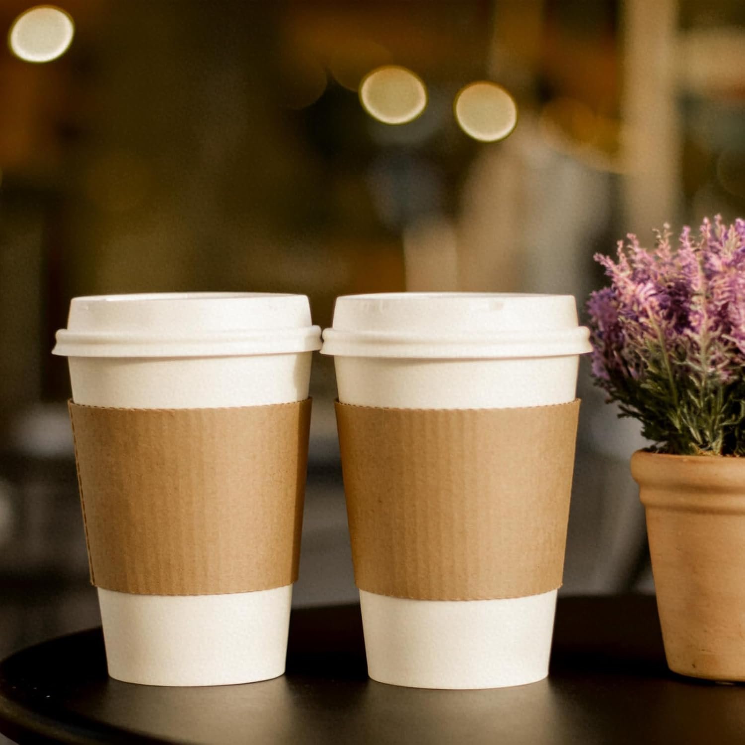 Grossiste de manchons à café en papier kraft jetables pour tasses de 10, 12, 16, 20 et 22 oz, OEM pour boissons chaudes et froides, fourni par un fabricant fiable. Grossiste de manchons à café en papier kraft jetables pour tasses de 10, 12, 16, 20 et 22 oz, OEM pour boissons chaudes et froides, fourni par un fabricant fiable.