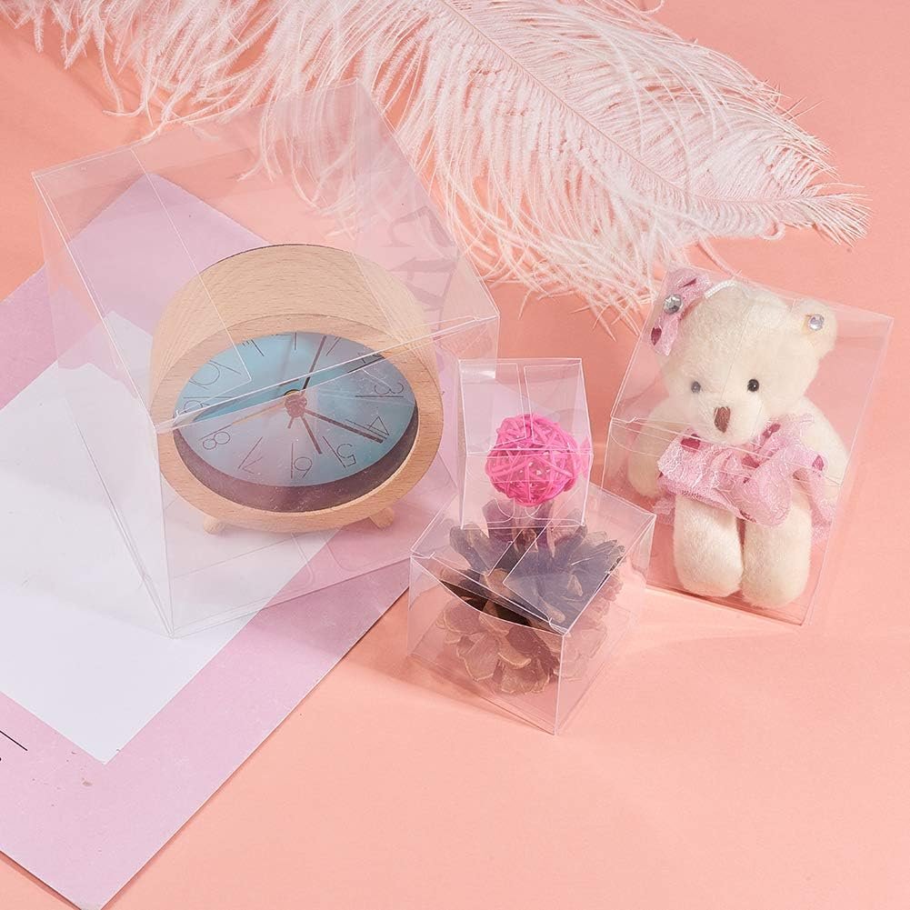 Grossiste Boîte de Favor en Plastique Transparent 60PCS 2.4x2.4x2.4 pouces pour Chocolat et Desserts, OEM pour Mariages, Fêtes d'Halloween et de Noël, Emballage de Cadeaux en Vrac Grossiste Boîte de Favor en Plastique Transparent 60PCS 2.4x2.4x2.4 pouces pour Chocolat et Desserts, OEM pour Mariages, Fêtes d'Halloween et de Noël, Emballage de Cadeaux en Vrac