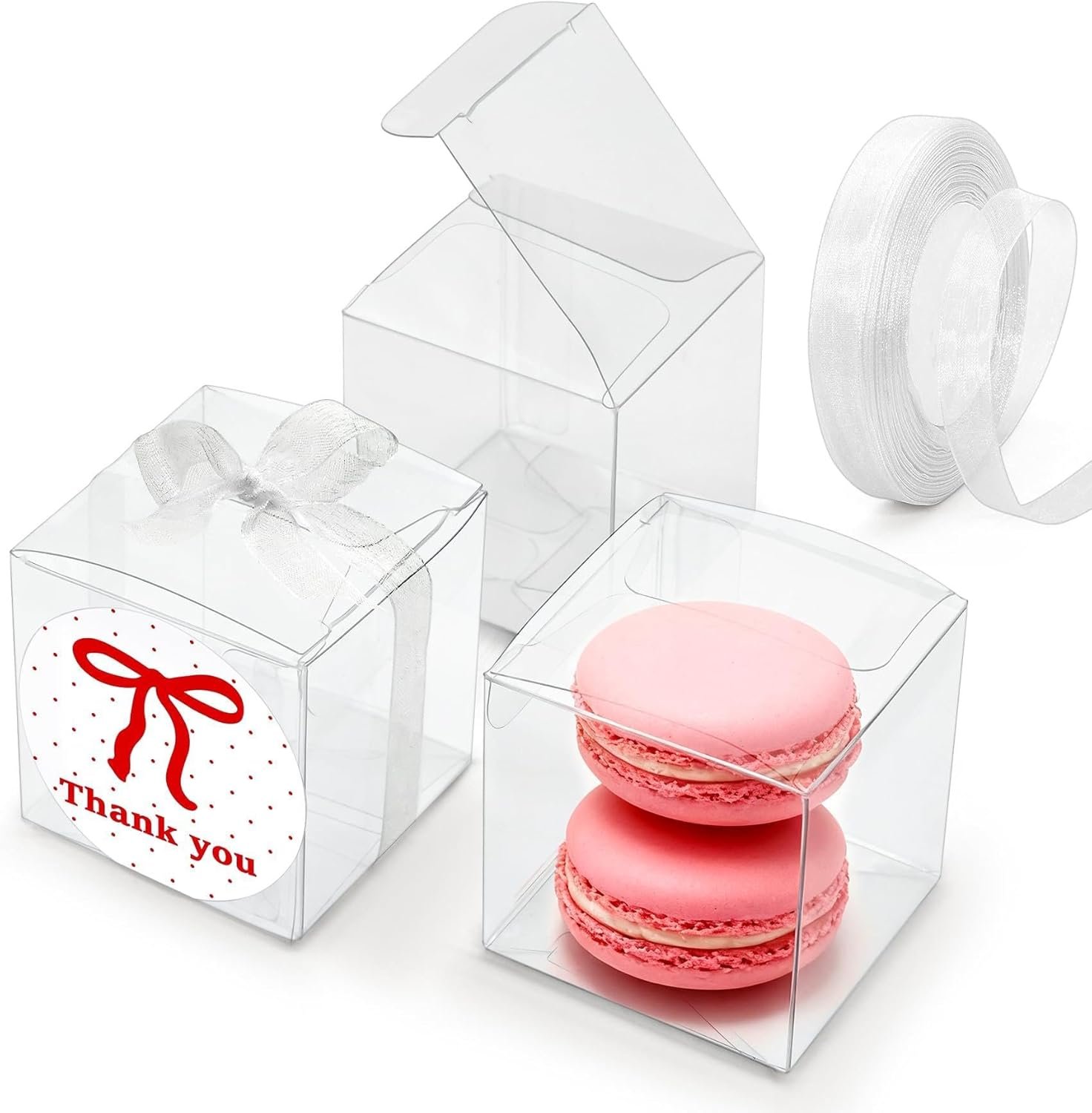 Grossiste Boîtes à Faveurs Transparentes 2x2x2 avec Rubans et Autocollants Merci, Boîtes en Plastique pour Macarons, Bonbons, Idéales pour Mariage, Baby Shower, Anniversaire, Logo Personnalisé, Fabricant de Produits en Vrac Grossiste Boîtes à Faveurs Transparentes 2x2x2 avec Rubans et Autocollants Merci, Boîtes en Plastique pour Macarons, Bonbons, Idéales pour Mariage, Baby Shower, Anniversaire, Logo Personnalisé, Fabricant de Produits en Vrac